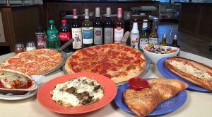 Piza Pasta Strombolis Calzones, Wine Beer Soda and salads